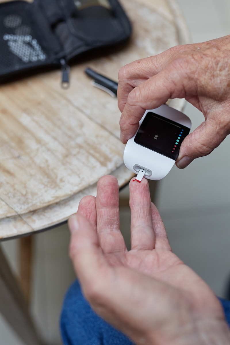 a person blood sugar testing using a gluco-meter